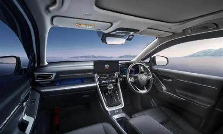 Teknologi Interior Mobil Interior mobil modern dengan layar sentuh dan kontrol kemudi