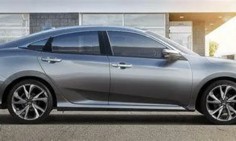 Honda Civic Sedan 2020 Honda Civic Sedan 2020 berwarna putih di jalan raya