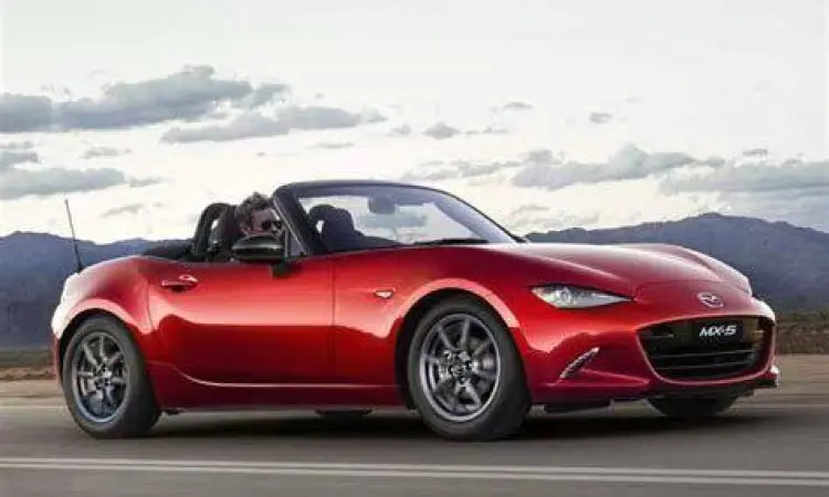 Mazda MX-5 Handling Mazda MX-5 sedang bermanuver di tikungan