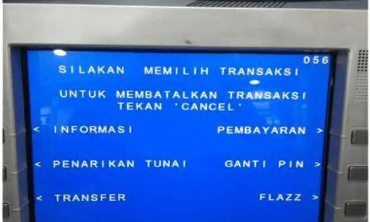 Konfirmasi Transaksi ATM Tampilan layar konfirmasi transfer di mesin ATM