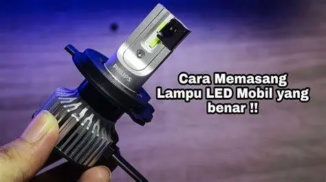 Instalasi Lampu Mobil Proses instalasi lampu mobil di bengkel spesialis